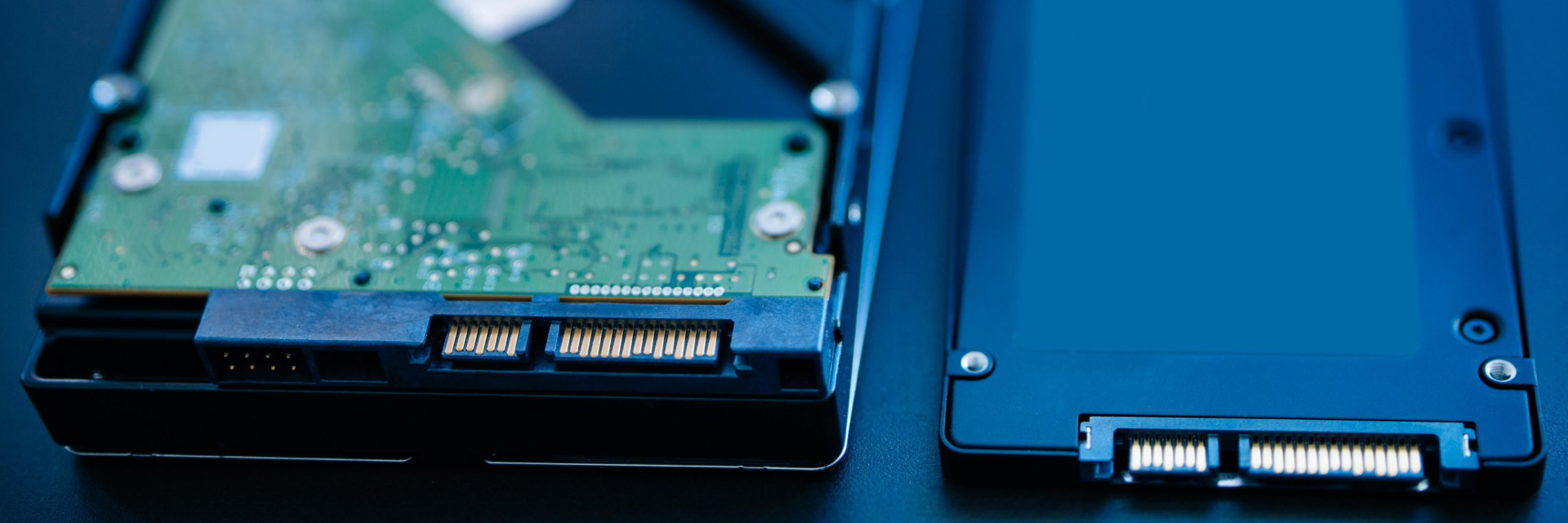 Image of a hard disk drive and a solid state drive side by side - AnyPcFixed Ltd - SSD Upgrades - Laptop Repair, Service & Upgrade in Leicester